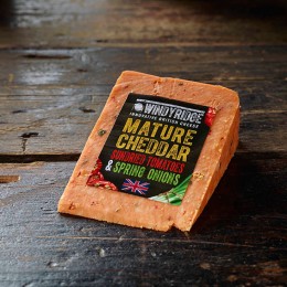Cheddar with sun dried tomatoes & spring onions 150g